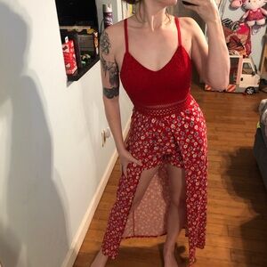 Red No Boundaries romper dress with lace trim,